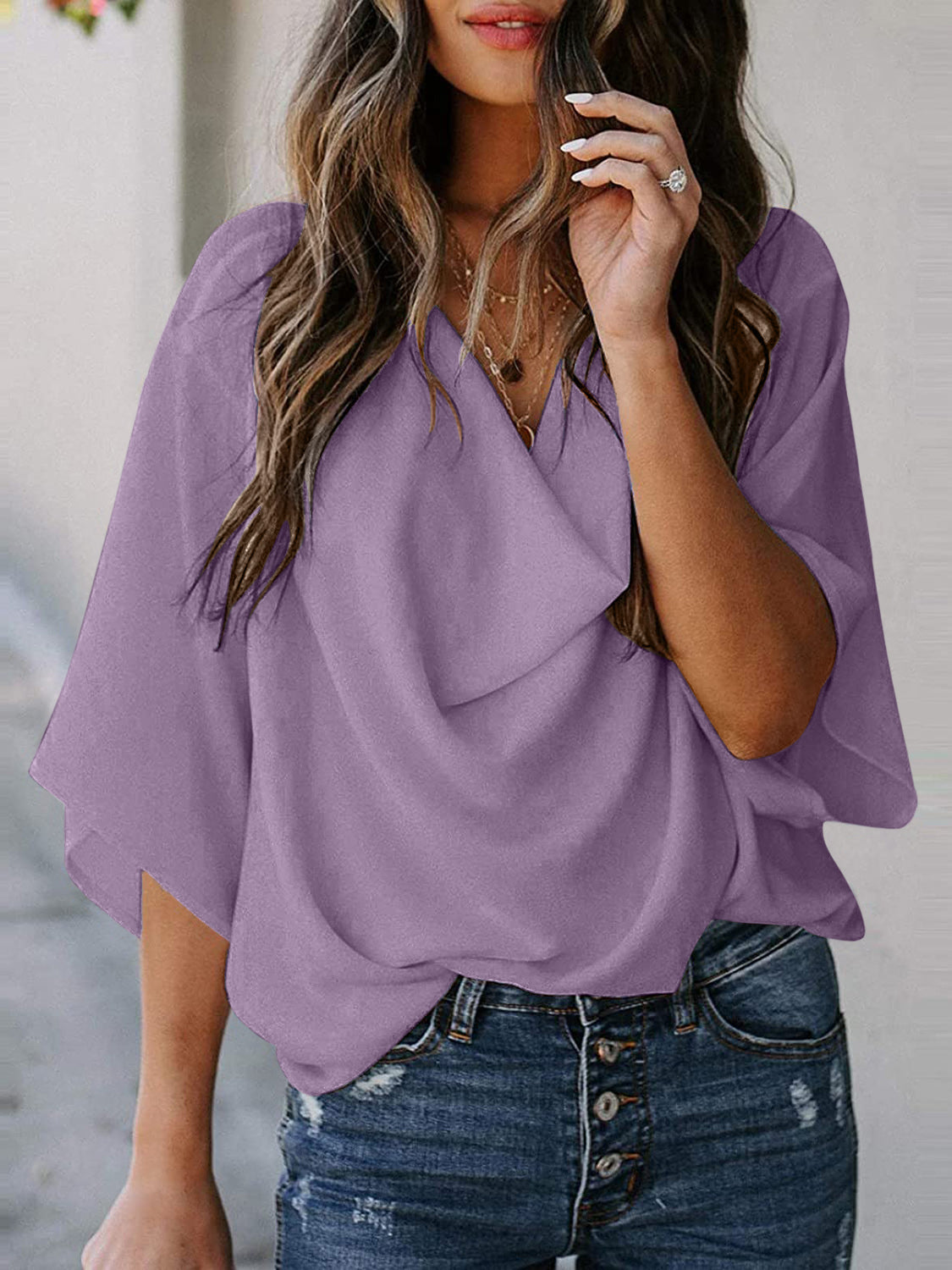 Blusa de manga tres cuartos con cuello vuelto y talla completa