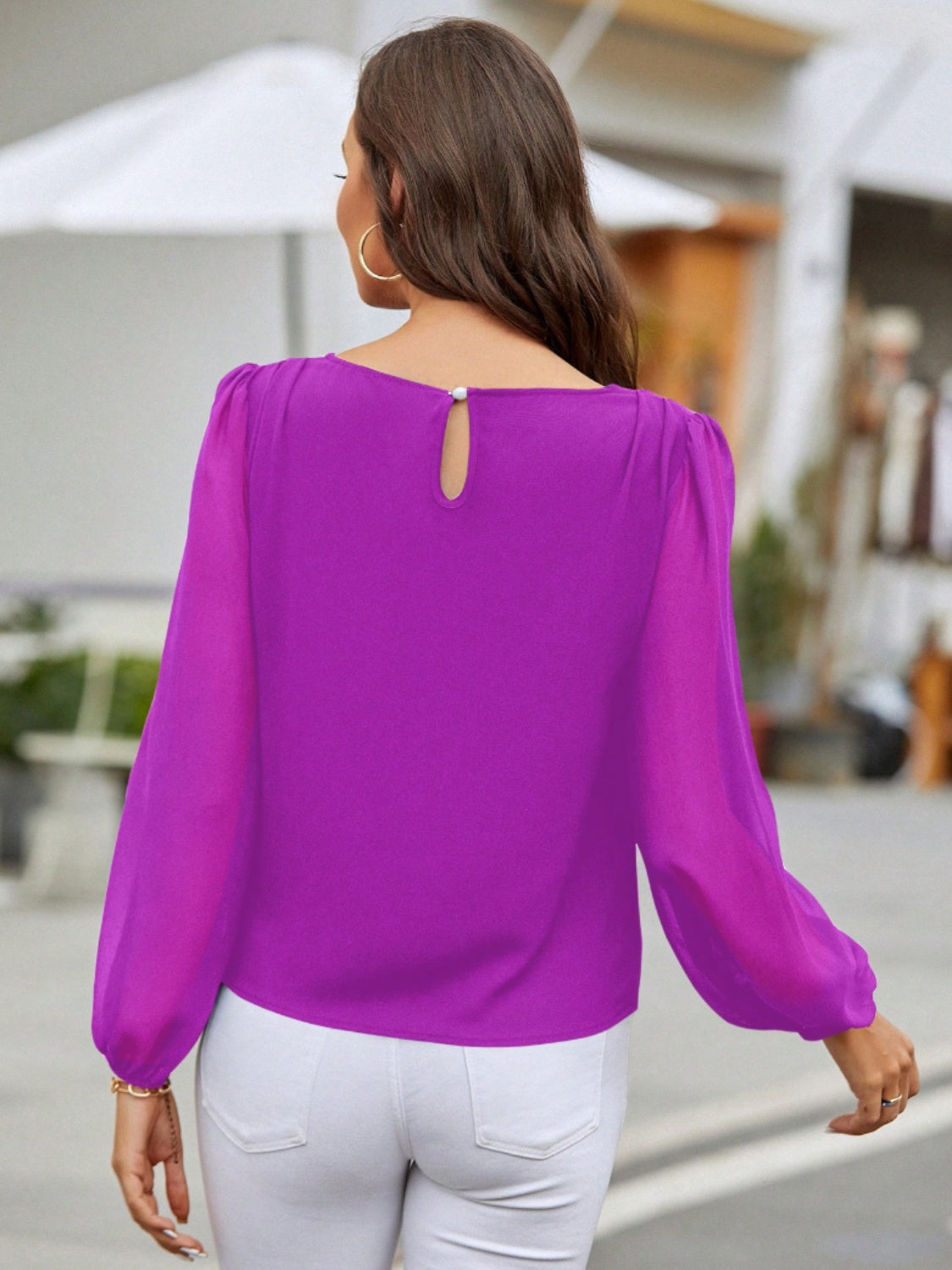 Blusa de manga larga con cuello redondo