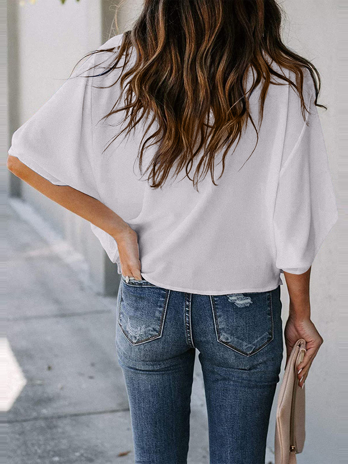 Blusa de manga tres cuartos con cuello vuelto y talla completa