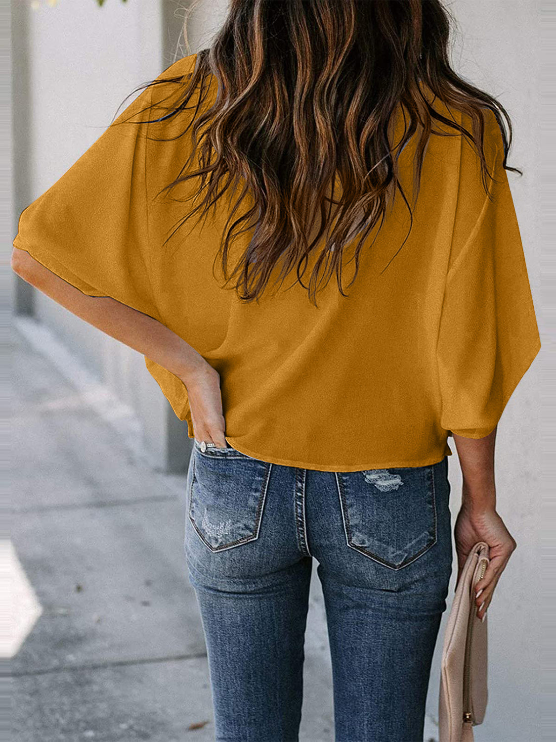 Blusa de manga tres cuartos con cuello vuelto y talla completa