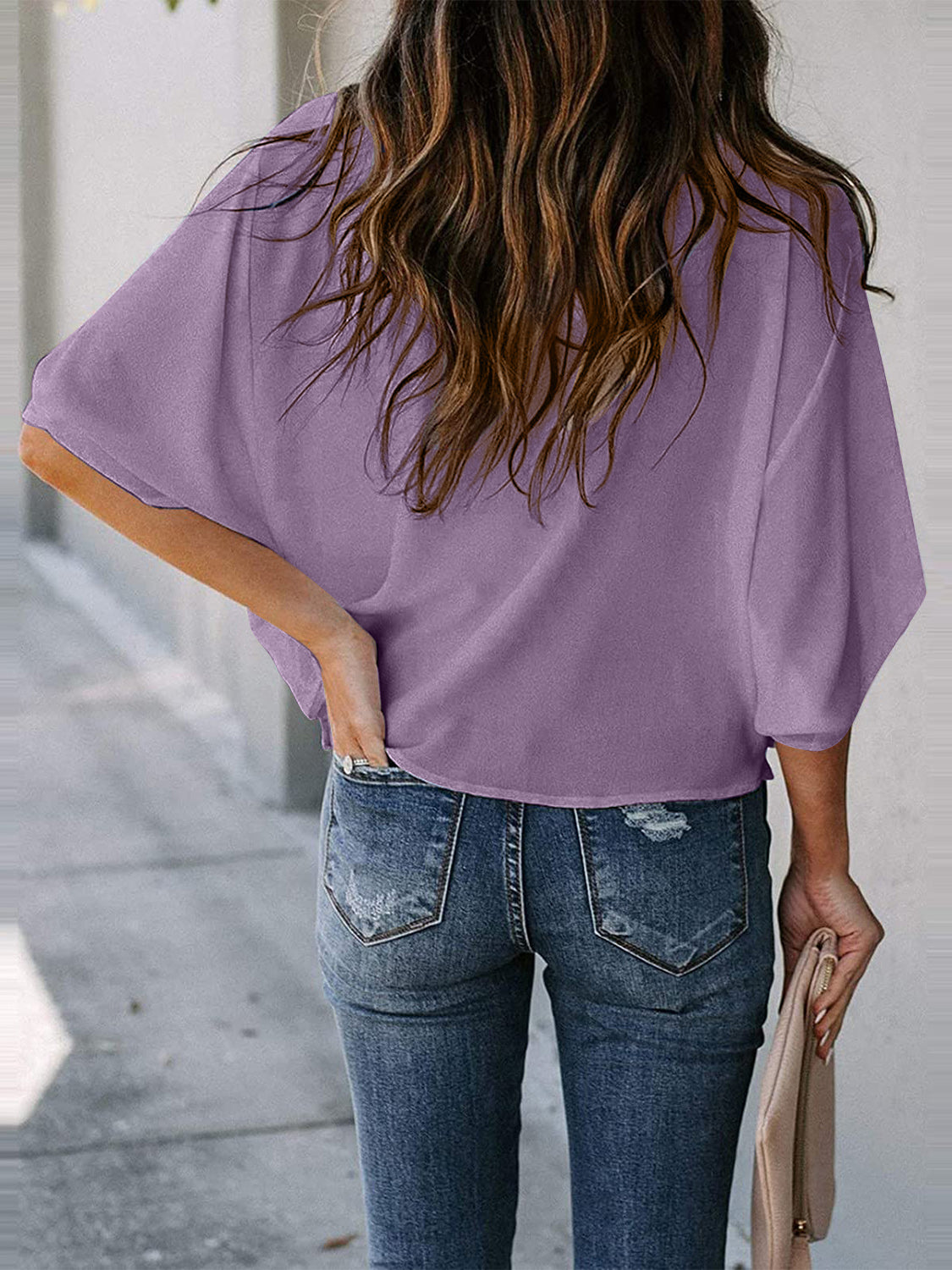 Blusa de manga tres cuartos con cuello vuelto y talla completa