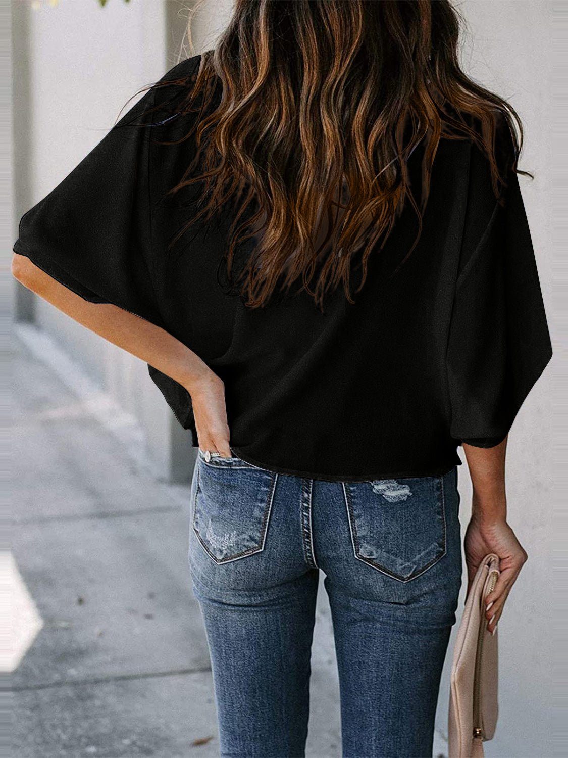 Blusa de manga tres cuartos con cuello vuelto y talla completa