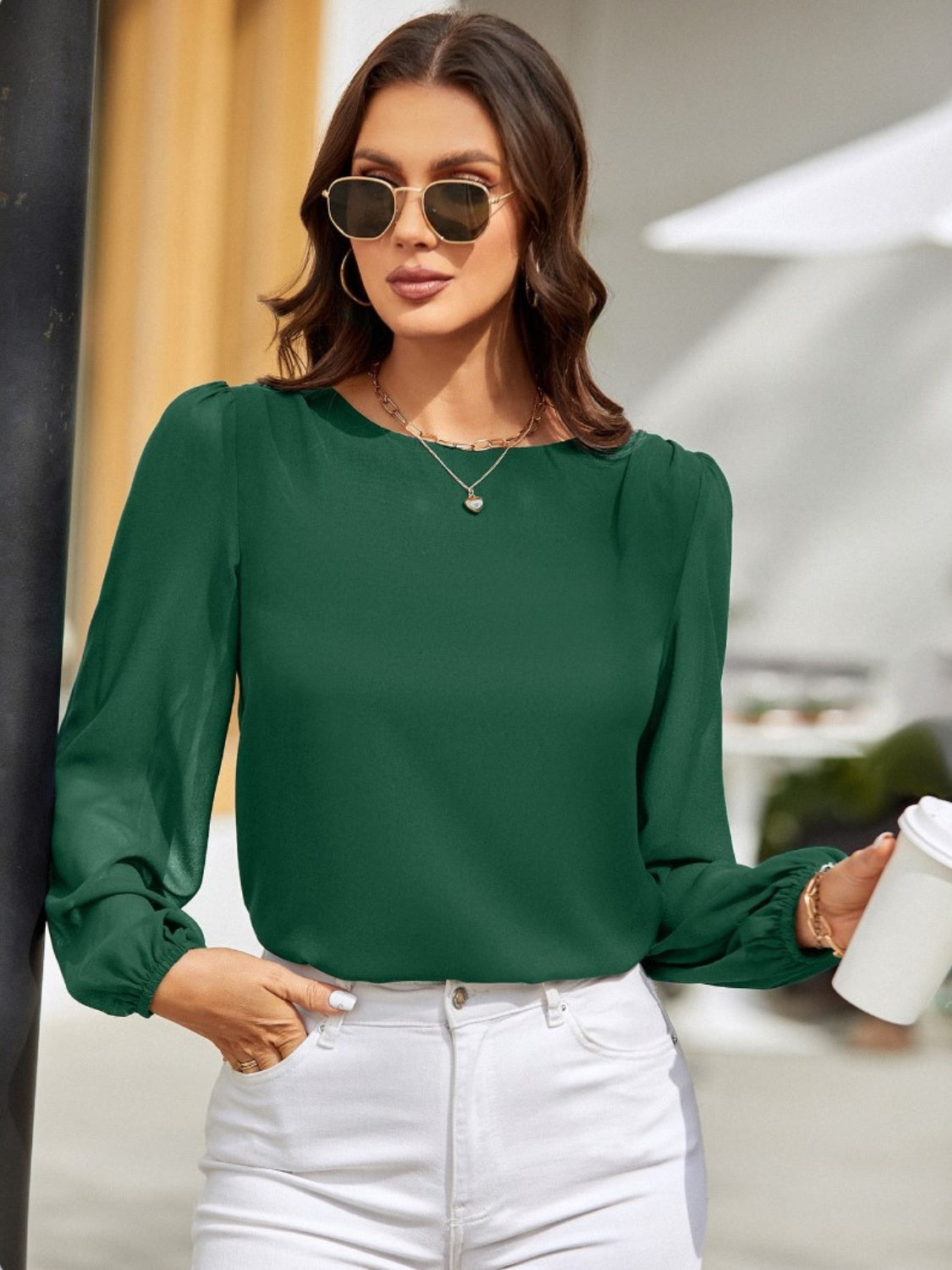 Blusa de manga larga con cuello redondo