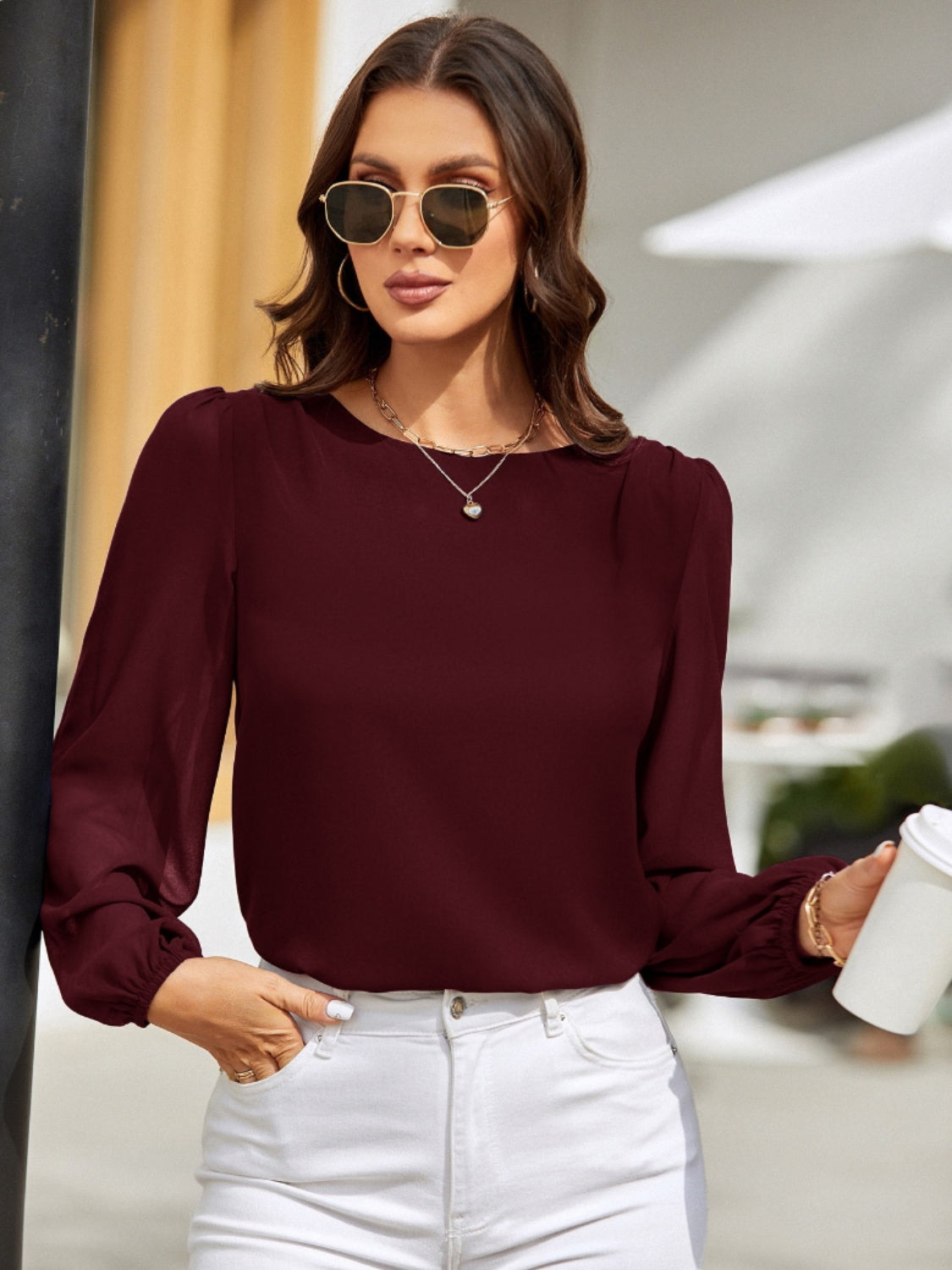 Blusa de manga larga con cuello redondo