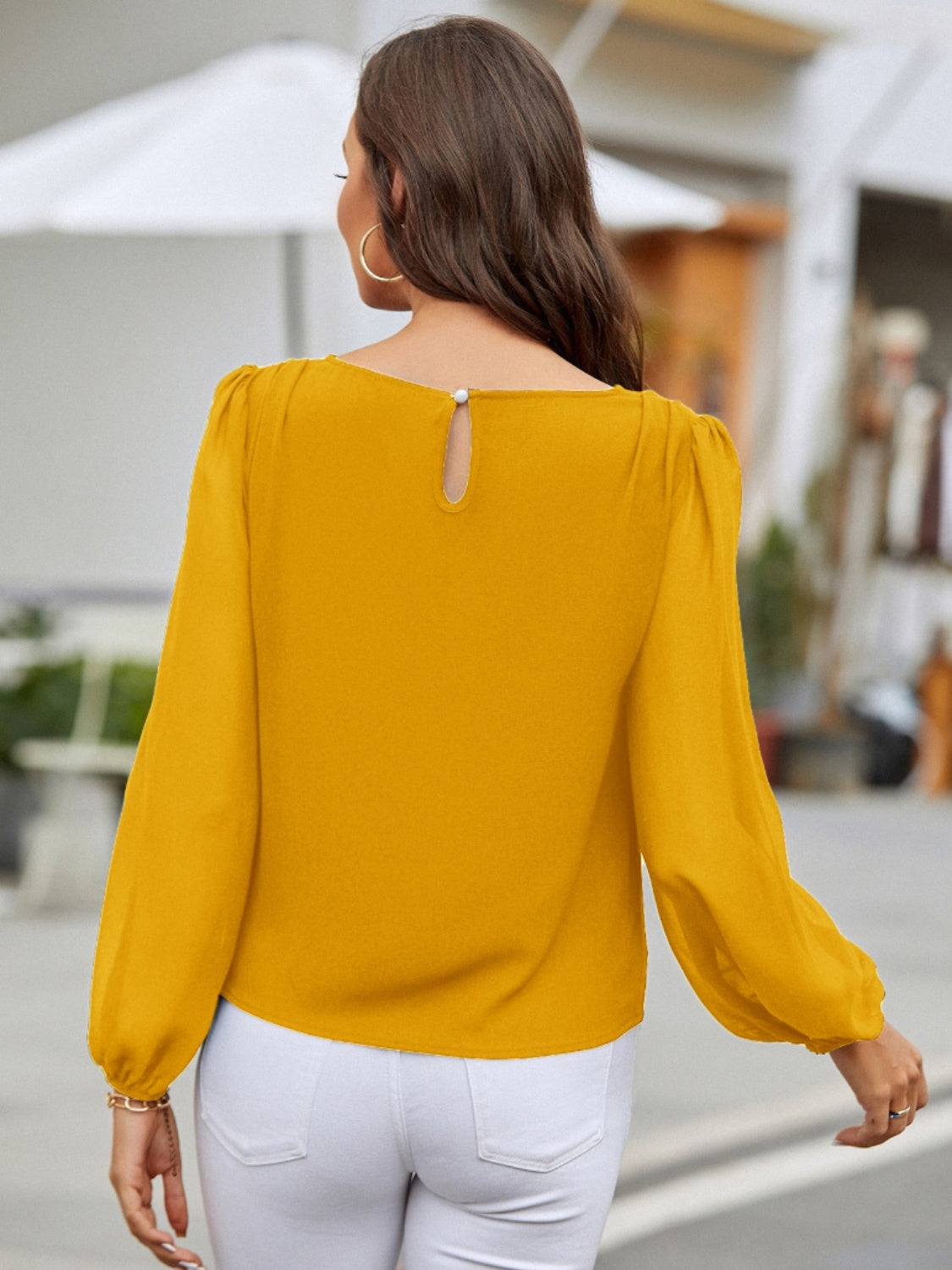 Blusa de manga larga con cuello redondo