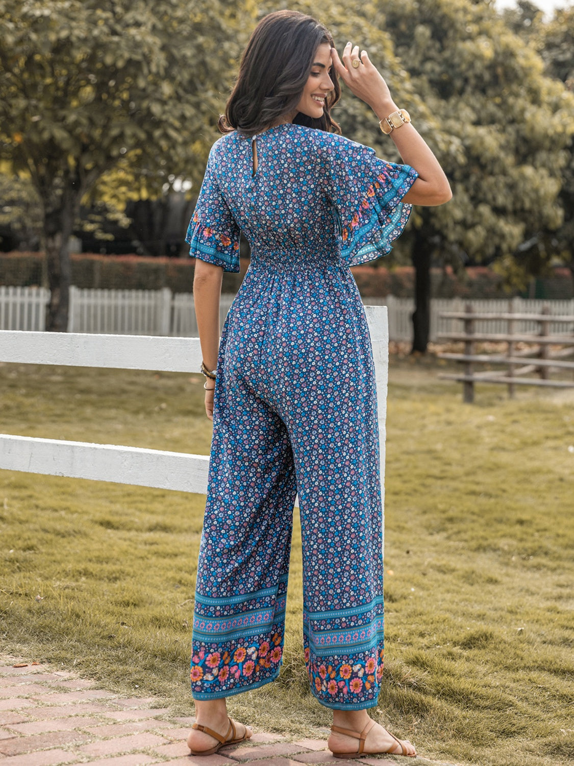 Floral Surplice Flutter Sleeve Jumpsuit