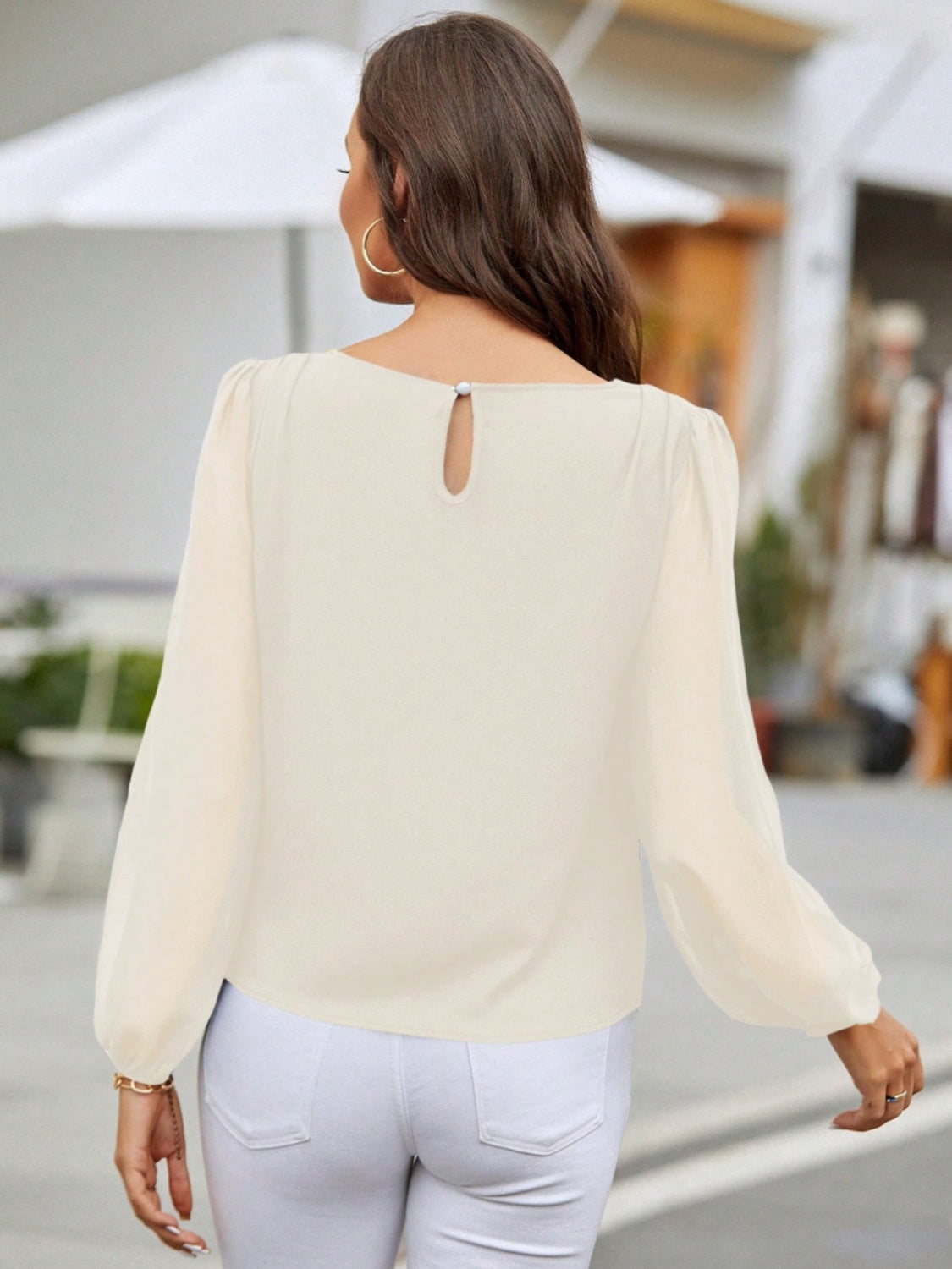 Blusa de manga larga con cuello redondo