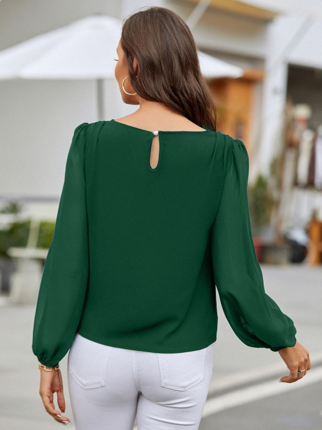 Blusa de manga larga con cuello redondo