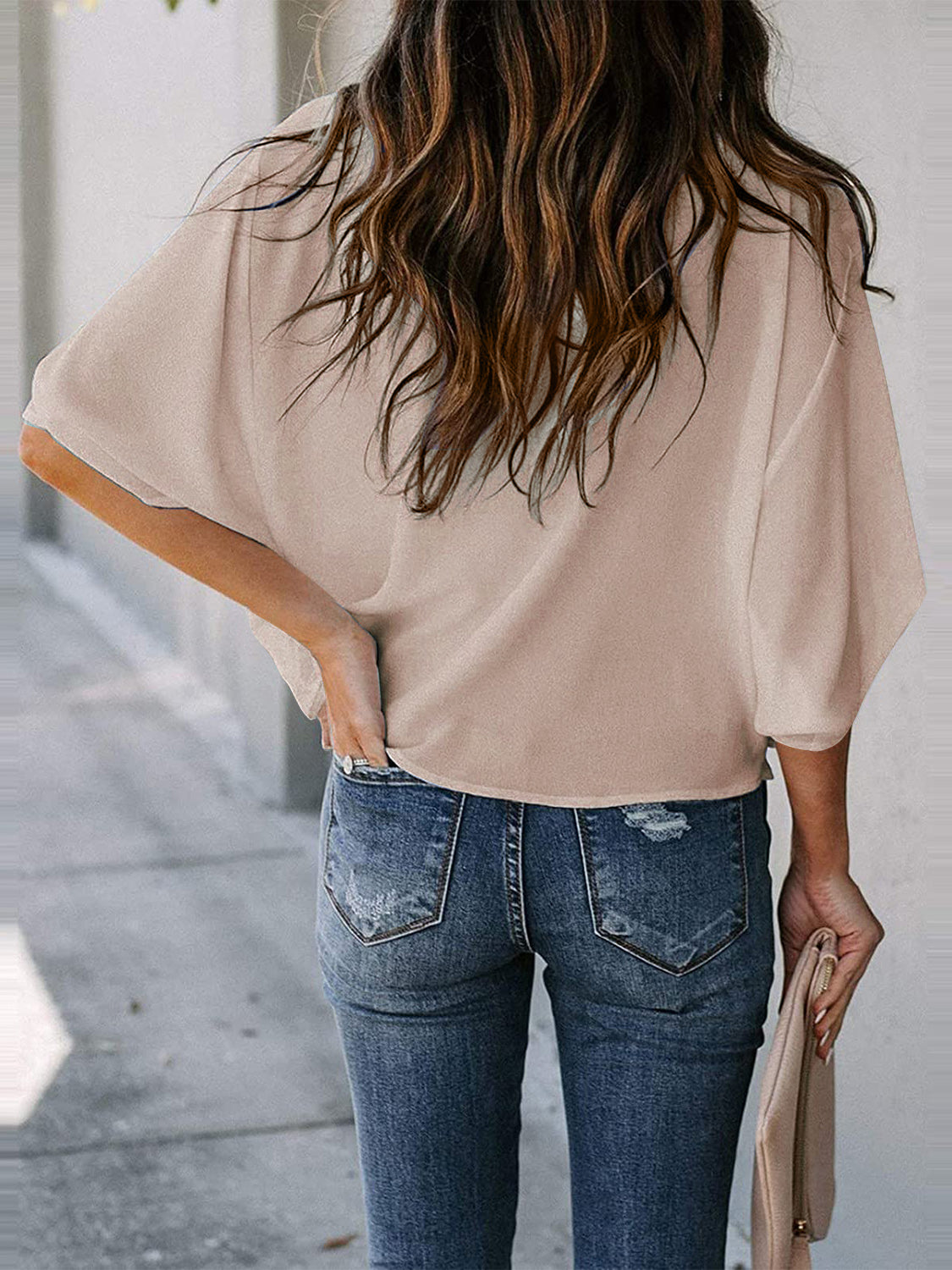 Blusa de manga tres cuartos con cuello vuelto y talla completa