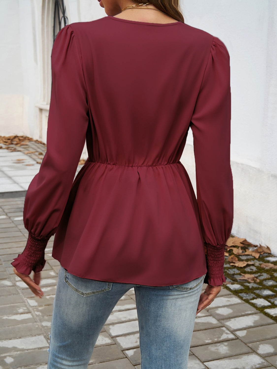 Blusa de manga larga con sobrepelliz fruncido