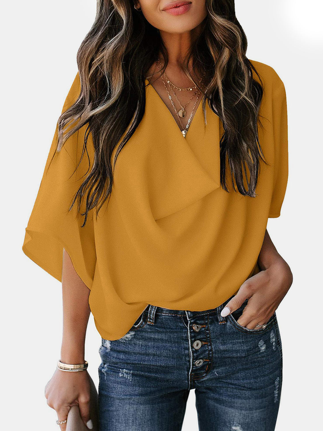 Blusa de manga tres cuartos con cuello vuelto y talla completa