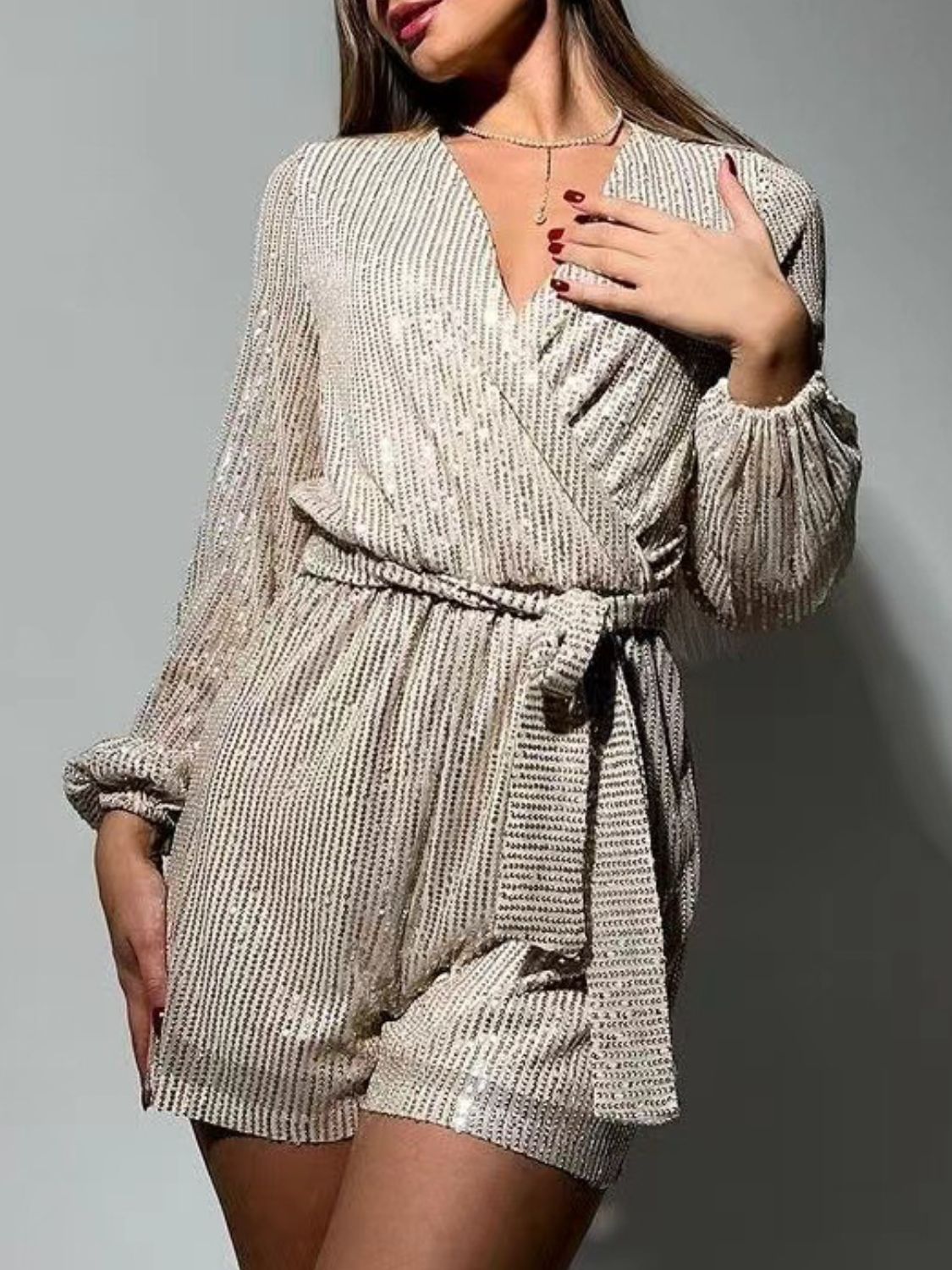 Full Size Sequin Surplice Tie Waist Long Sleeve Romper