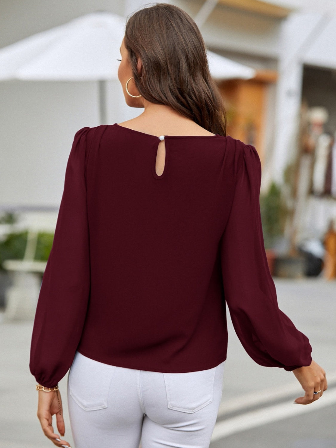 Blusa de manga larga con cuello redondo