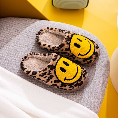 Pantuflas de leopardo con cara sonriente de Melody