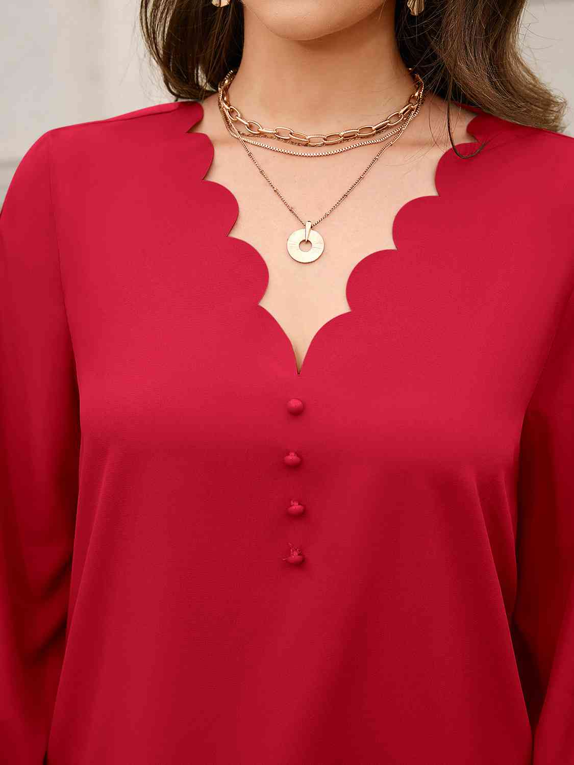 Blusa de manga larga con cuello en V