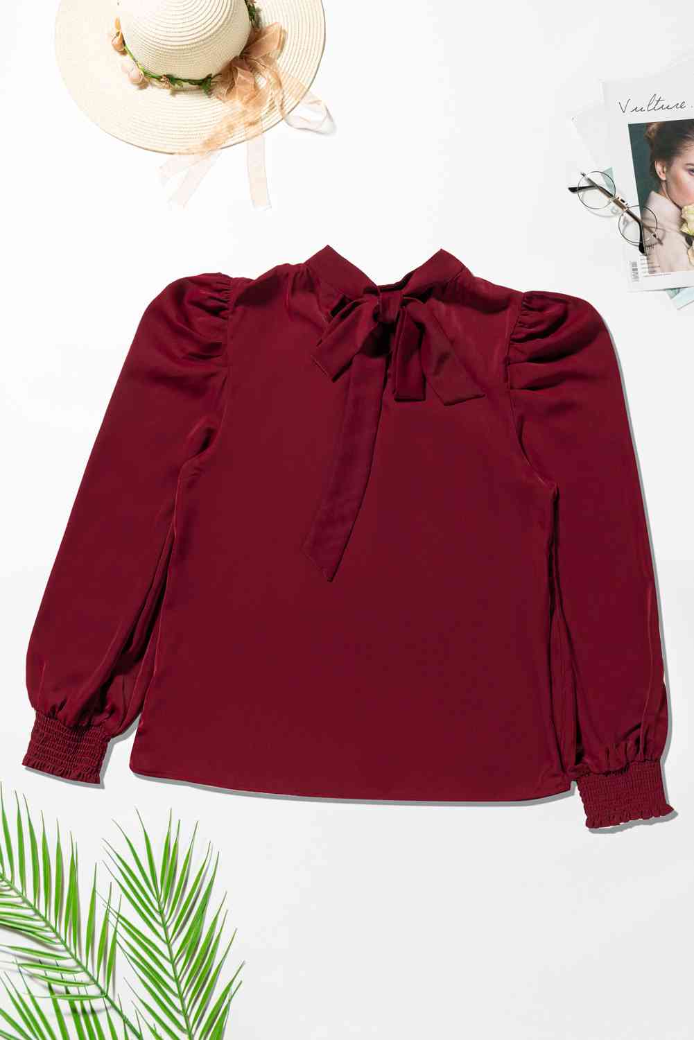 Blusa con mangas abullonadas y cuello simulado