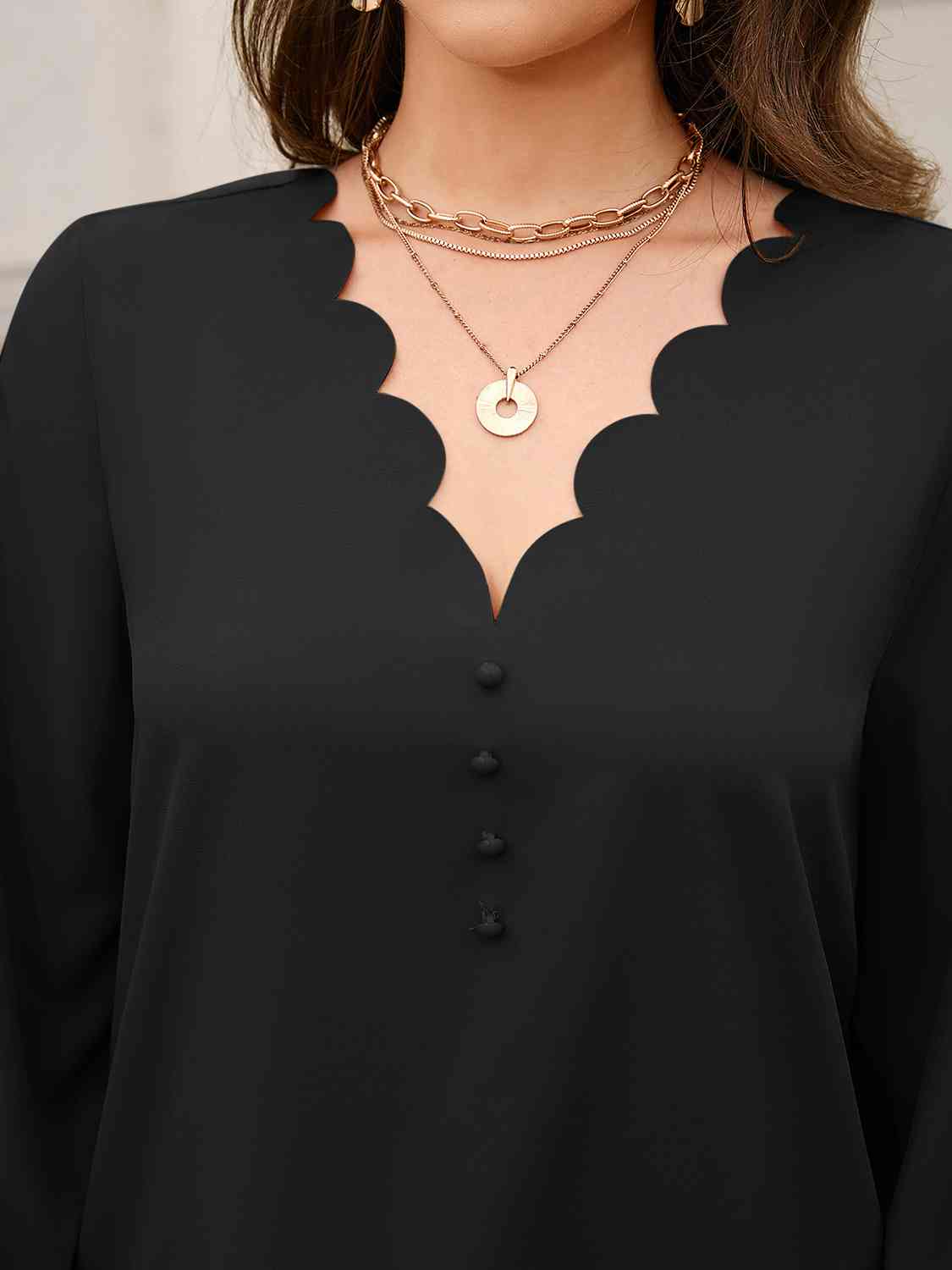 Blusa de manga larga con cuello en V